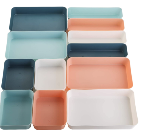 Blue, peach, and white drawer organizers