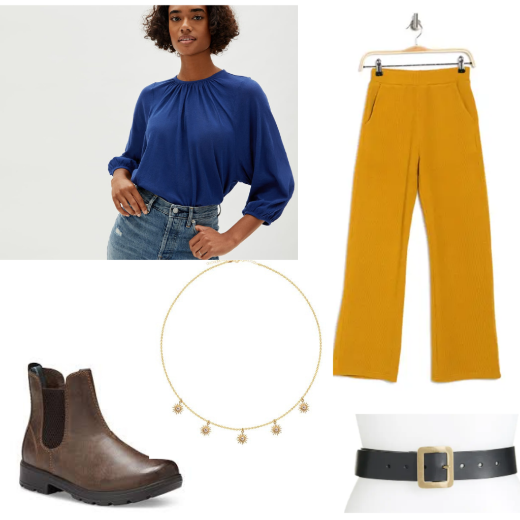 Alina Starkov Outfit with a blue blouse, yellow pants, brown boots, belt, and sun charm necklace.