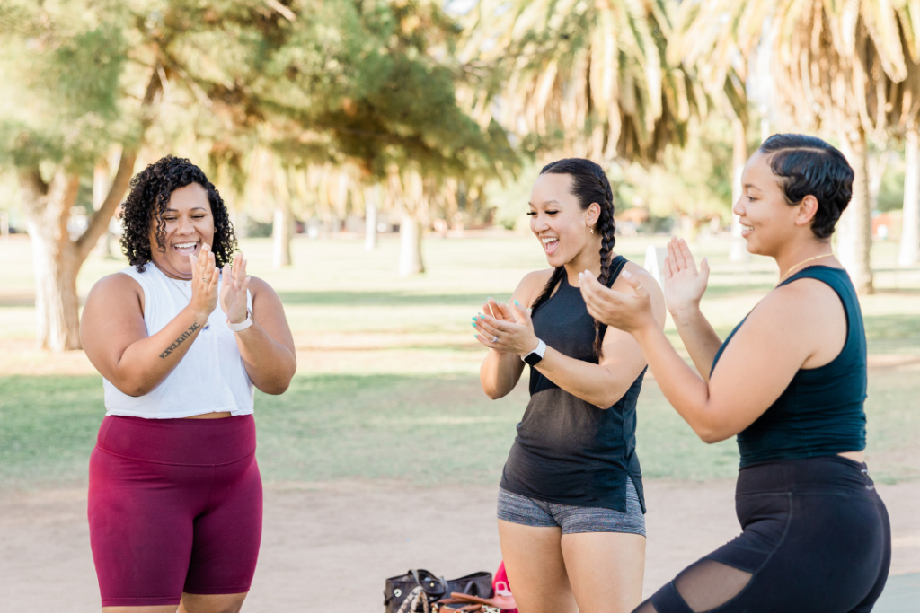 Women clapping