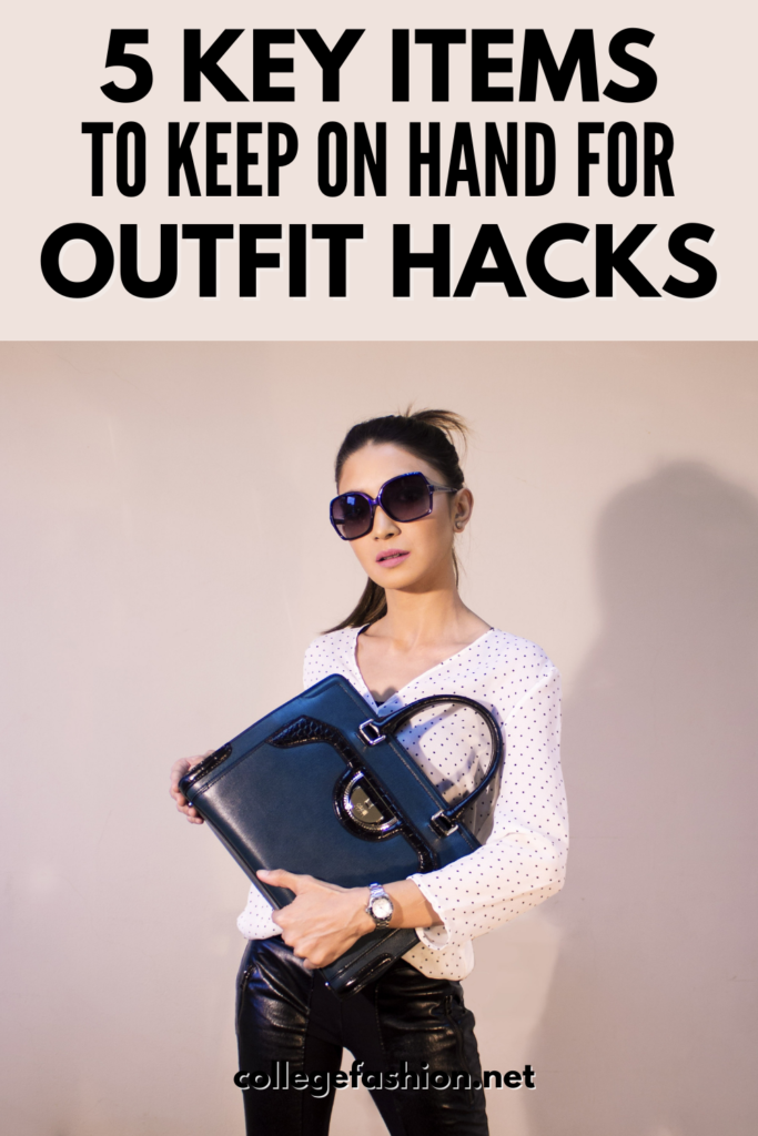 5 items to keep on hand for outfit hacks, from safety pins to fashion tape | Photo of a woman holding a handbag in front of her body while wearing a fashionable outfit