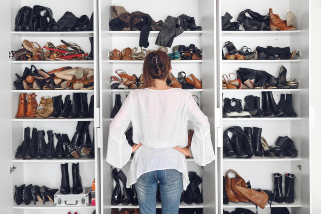 Woman cleaning out her closet