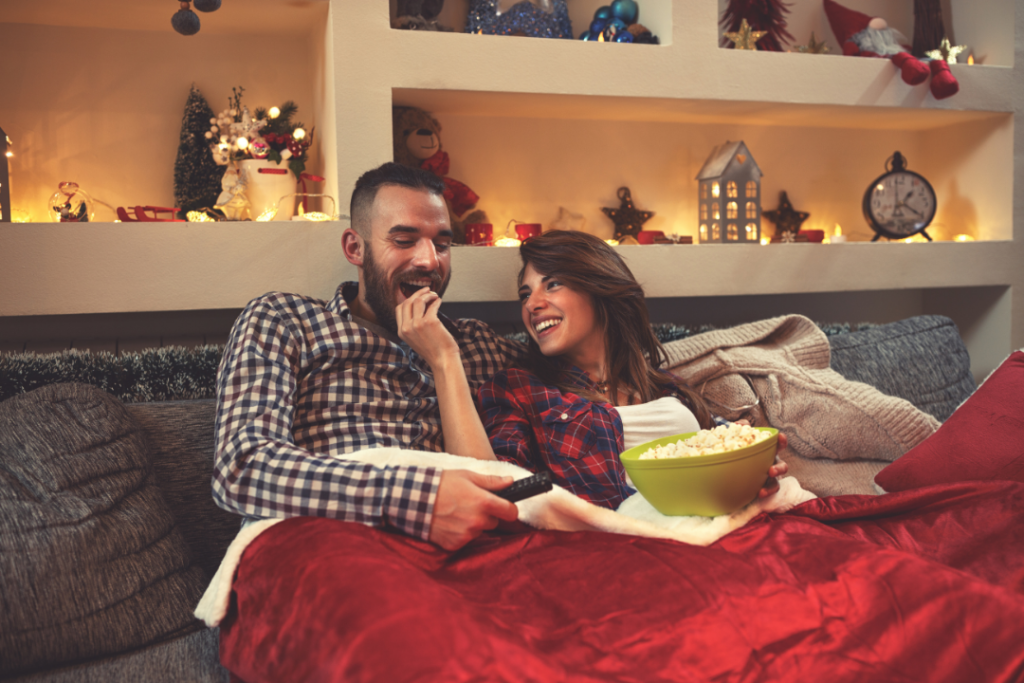 Couple watching holiday movies together