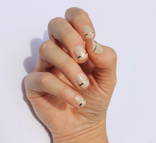 Nude and gold stripe nails