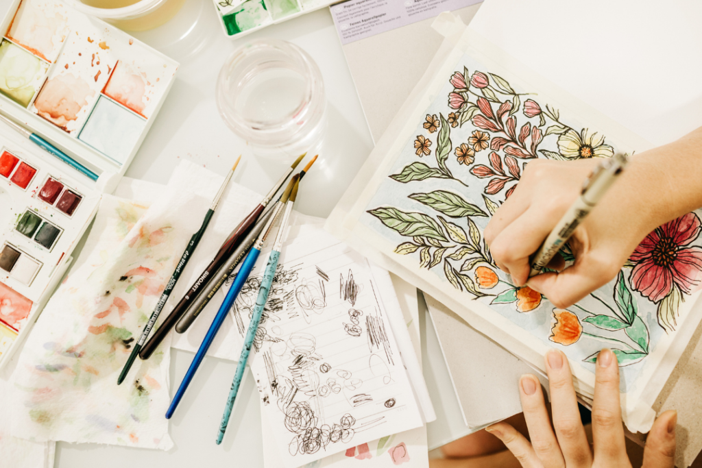 Woman drawing flowers