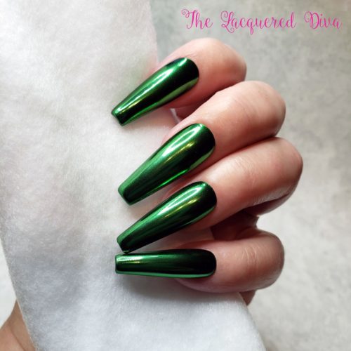 Photo of a long coffin shaped manicure with emerald green chrome polish