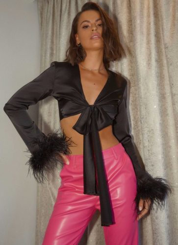Peppermayo Feather Crop Top in black paired with pink leather pants