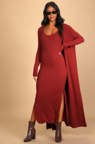 Maxi dress and cardigan outfit for winter with burgundy maxi dress and matching long cardigan with sunglasses and brown ankle boots