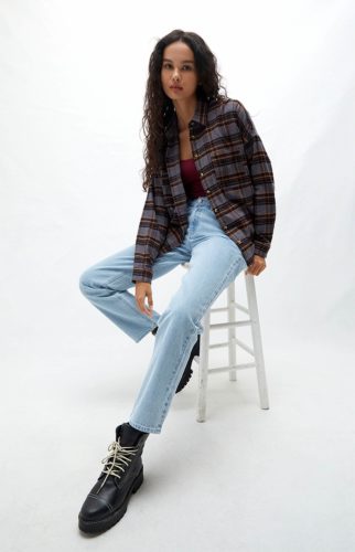 Cute and casual winter outfit with mom jeans, chunky black combat boots, burgundy tank, oversized brown shacket