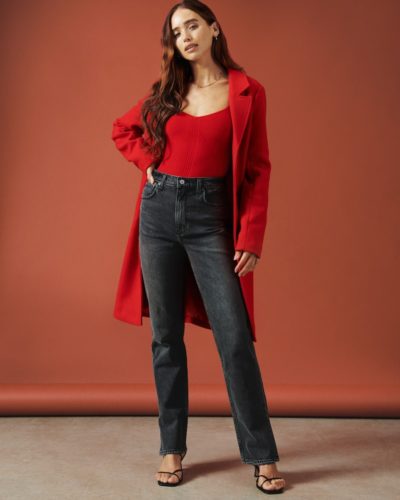 Abercrombie Red Bodysuit with black jeans, strappy black heels, and a red pea coat