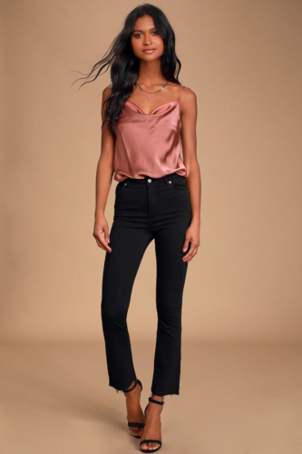 Valentine's Day bodysuit outfit with pink satin cowl neck bodysuit, black ripped jeans, black strappy heels, and silver necklaces