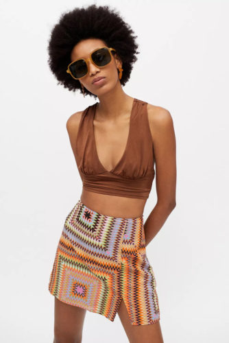 70s style clothing: geometric print Mini Skirt with slit