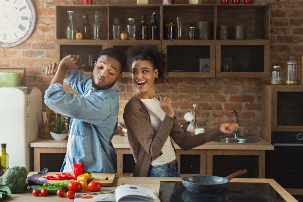 Couple cooking dinner together