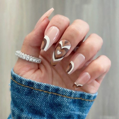 Brown heart swirl nails from etsy