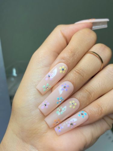 Nude coffin nails with colorful flowers and rhinestones