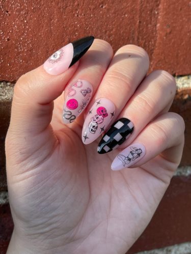 Pink nails with black punk nail art detailing