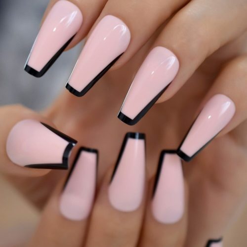 Light pink french nails with black outline in coffin shape