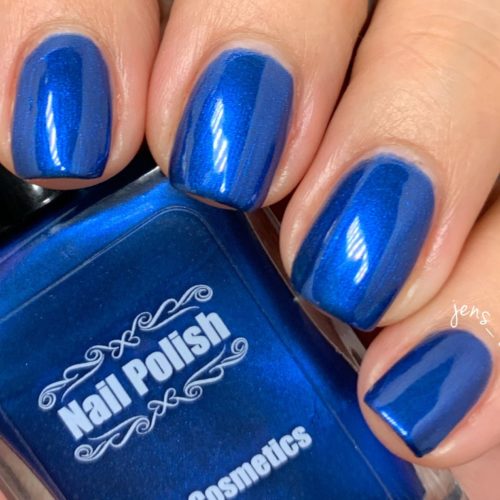 Royal Sapphire nail polish from MBA Cosmetics, applied to short nails