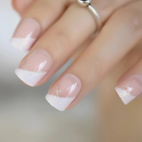 Short french nails with white and glitter tips