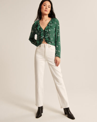 AF Green Blouse paired with white jeans, black boots
