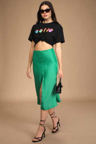 Lulus Green Satin Midi Skirt paired with black cropped t-shirt and strappy black heels
