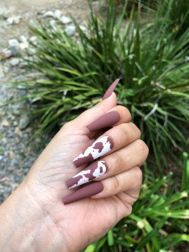 Brown matte cow print nails