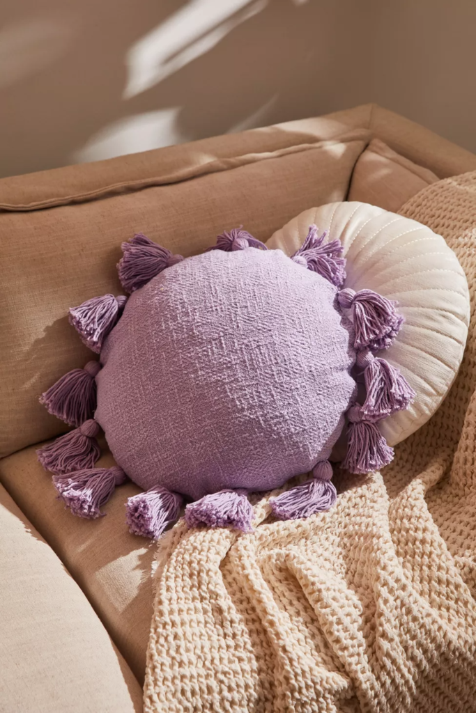 Decorative pillows in light purple and cream from urban outfitters