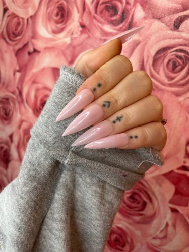 Long light pink stiletto nails