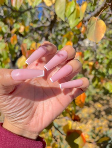 Long nude and white outline nails