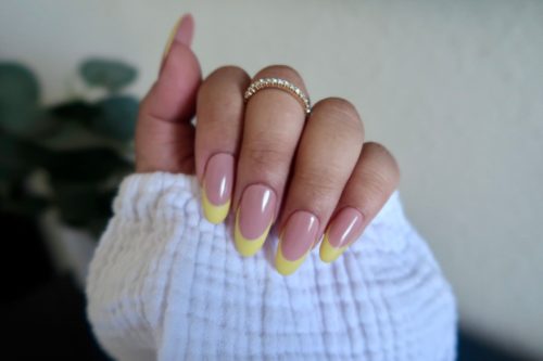 Yellow french tip nails