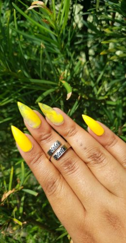 Yellow stiletto nails