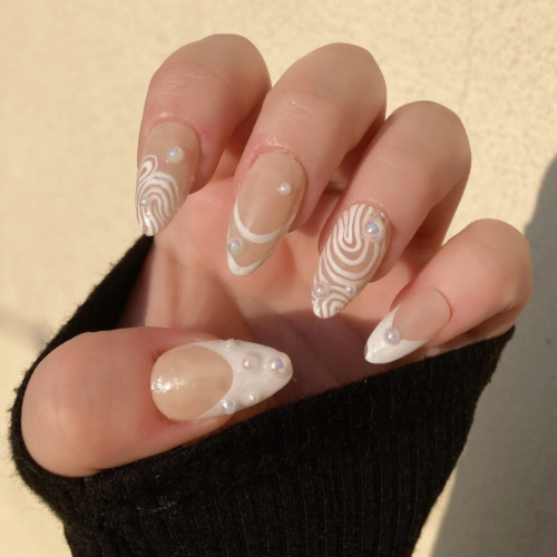 Abstract nails with pearl detailing