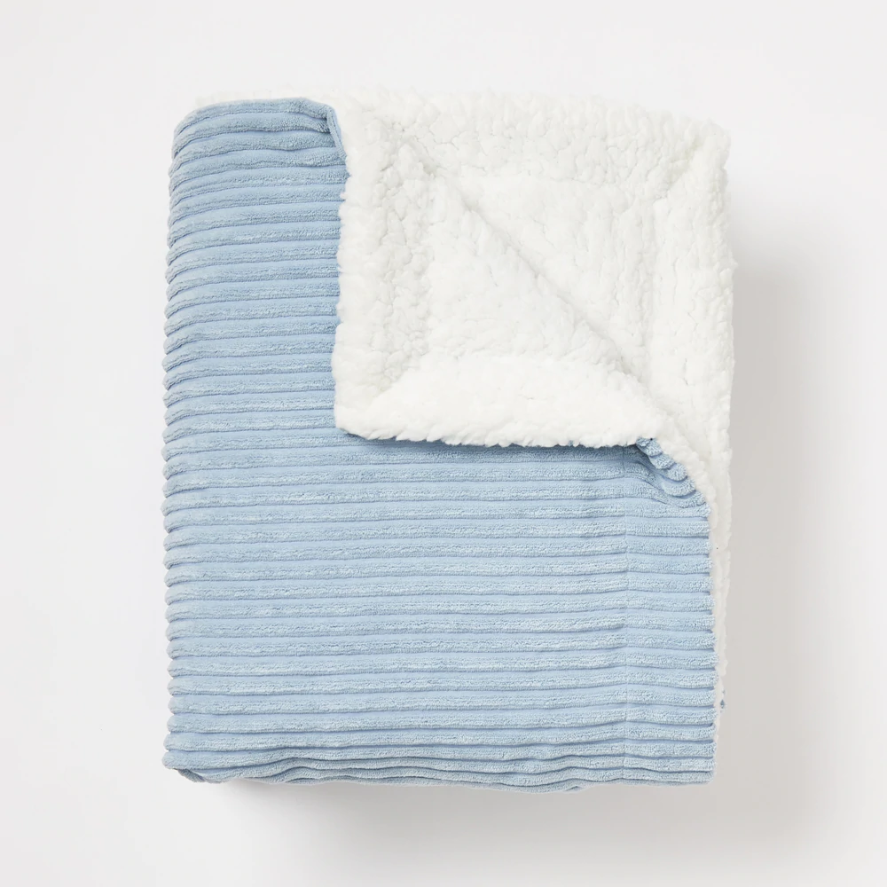 Light blue sherpa blanket