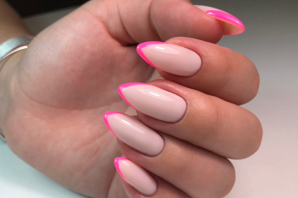 Neon pink v-shaped french nails