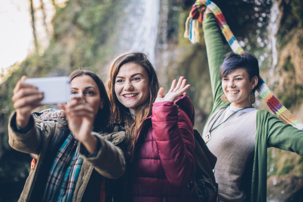 22nd birthday ideas - Women taking a selfie outside