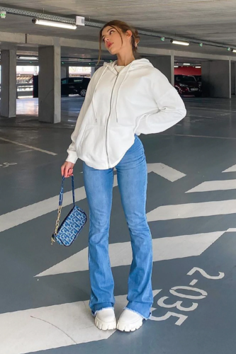Flare jeans and sweatshirt outfit