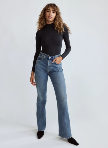 Mid wash flares outfit with black turtleneck bodysuit and black sock boots