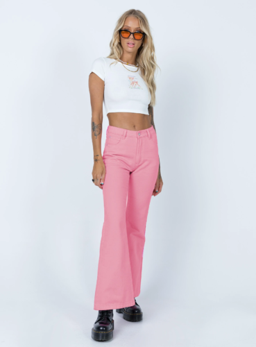 Pink flare jeans and graphic tee oufit