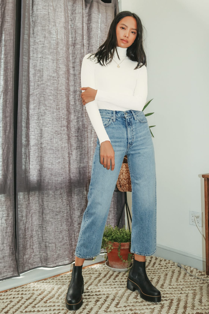 Cute baseball game outfit with bodysuit, jeans, and comfy boots