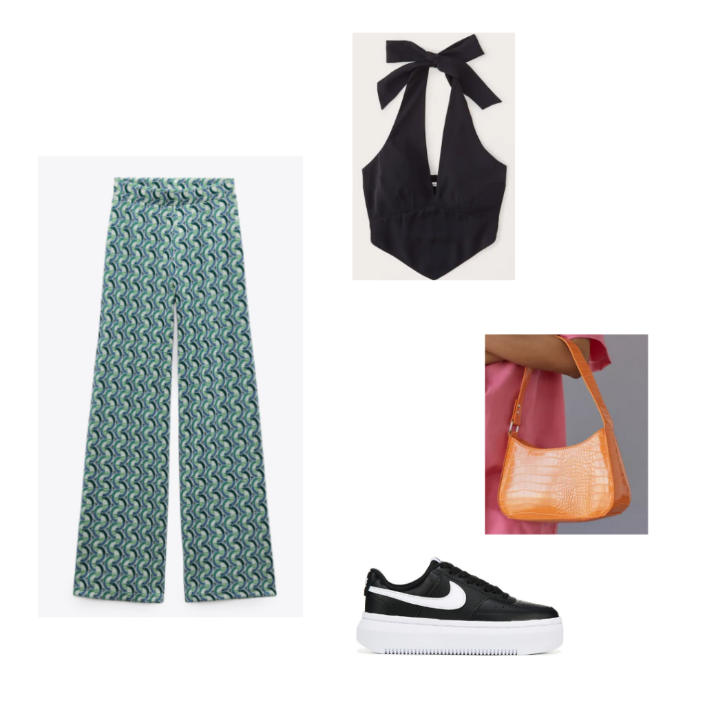 Long pants music festival outfit with black halter top, neon orange croc bag, chunky black and white platform sneakers