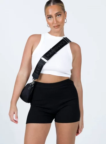 Muscle tee from princess polly with black bike shorts and crossbody bag