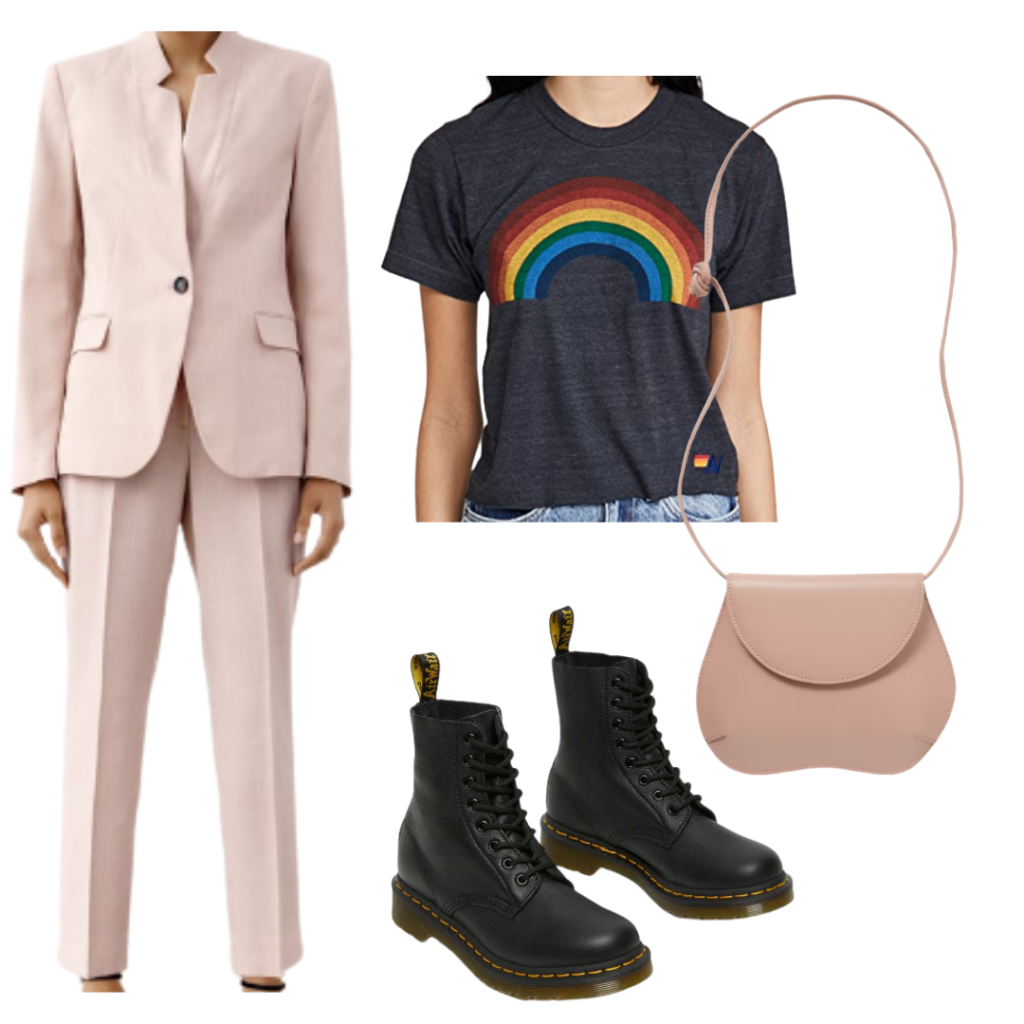 Light pink suit paired with black combat boots, black graphic tee, light pink crossbody bag