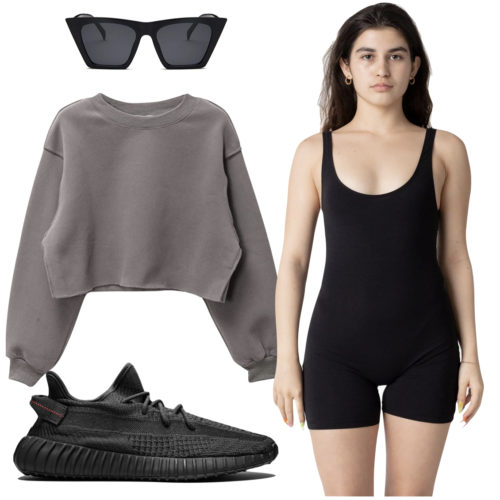 Yeezy 350 Black Static Outfit: black biketard onesie, black cat eye sunglasses, cropped sweatshirt and Yeezy 350 Black Static sneakers