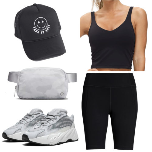 Yeezy Boost 700 Outfit: black cropped sports bra top, black biker shorts, black trucker hat, Lululemon belt bag, Yeezy Boost 700 sneakers