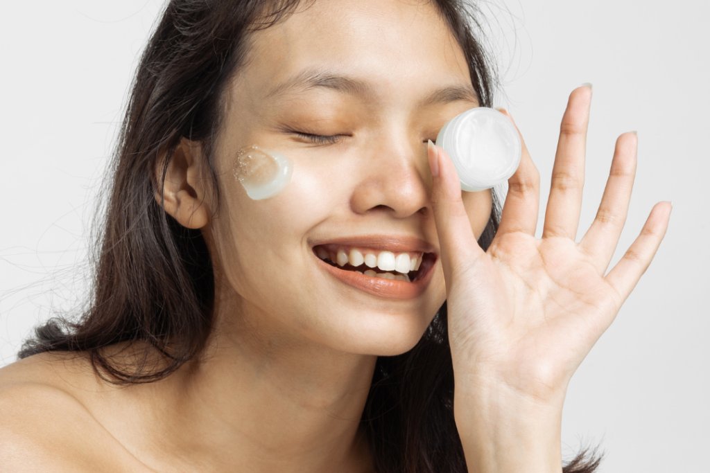 Photo of a woman using a Korean moisturizer for dry skin
