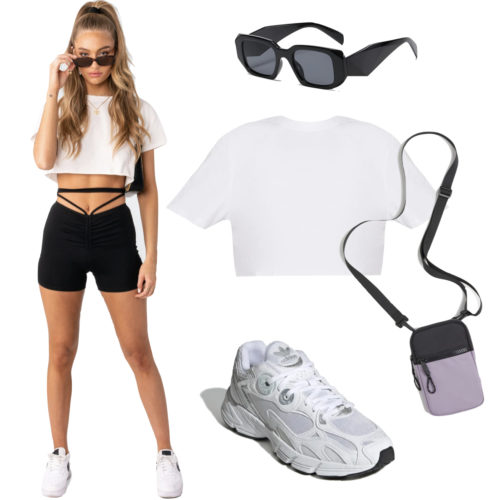 Walking the Las Vegas Strip Outfit: black tie-waist bike shorts, white cropped t-shirt, rectangle sunglasses, crossbody bag and white Adidas sneakers