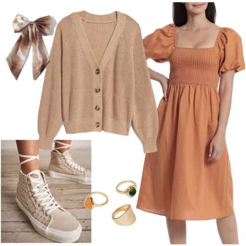 Cottagecore outfit with a rust-colored smocked puff sleeve dress, beige cardigan sweater, plaid bow hair barrette, neutral sneakers and gold rings