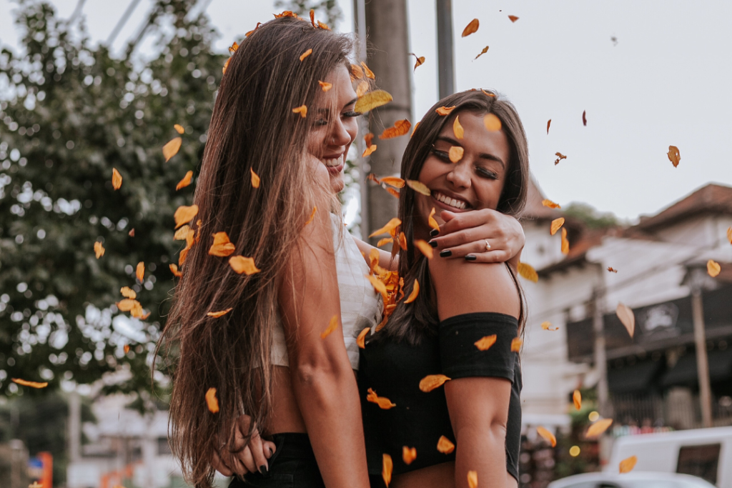 Two women having a fall photoshoot