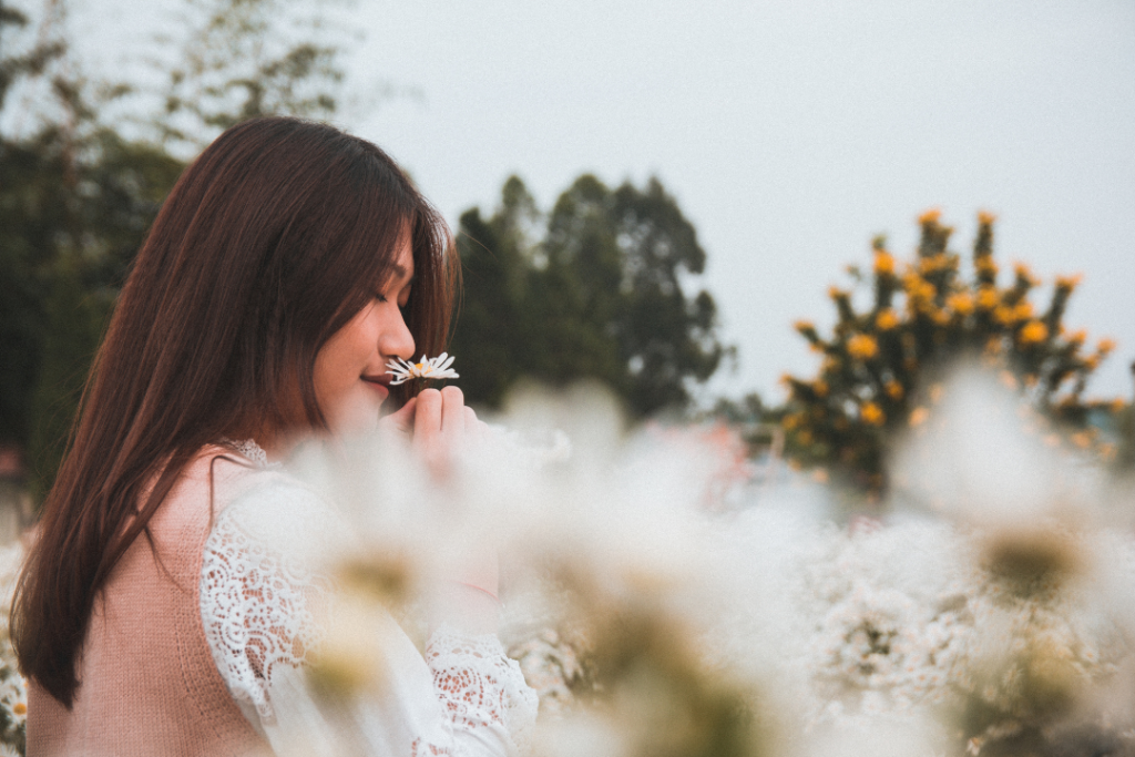 Woman at a flower garden