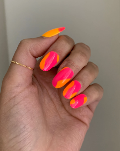 Neon pink and orange disco nails
