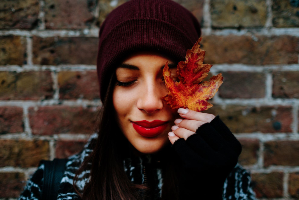 Woman holding a leaf